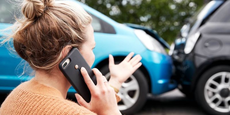 woman on phone after cat accident