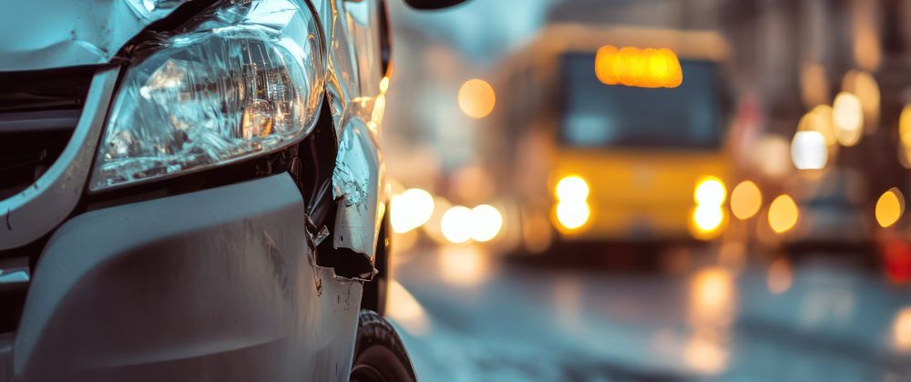 Delivery van with damage at accident scene