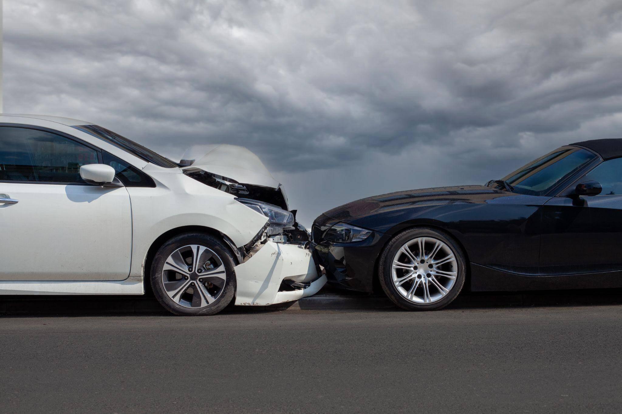 two cars that have been involved in a car accident